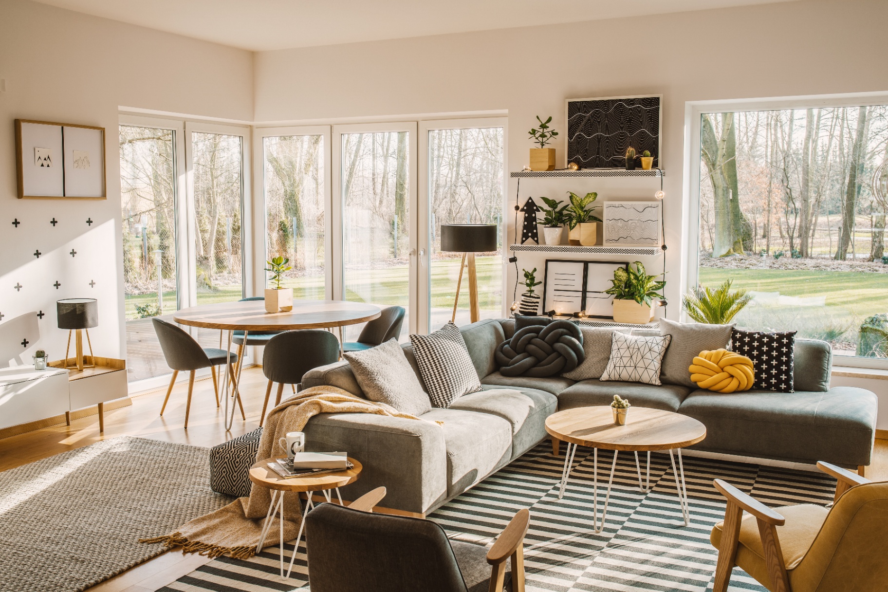 Bright modern living room with large windows and contemporary furniture